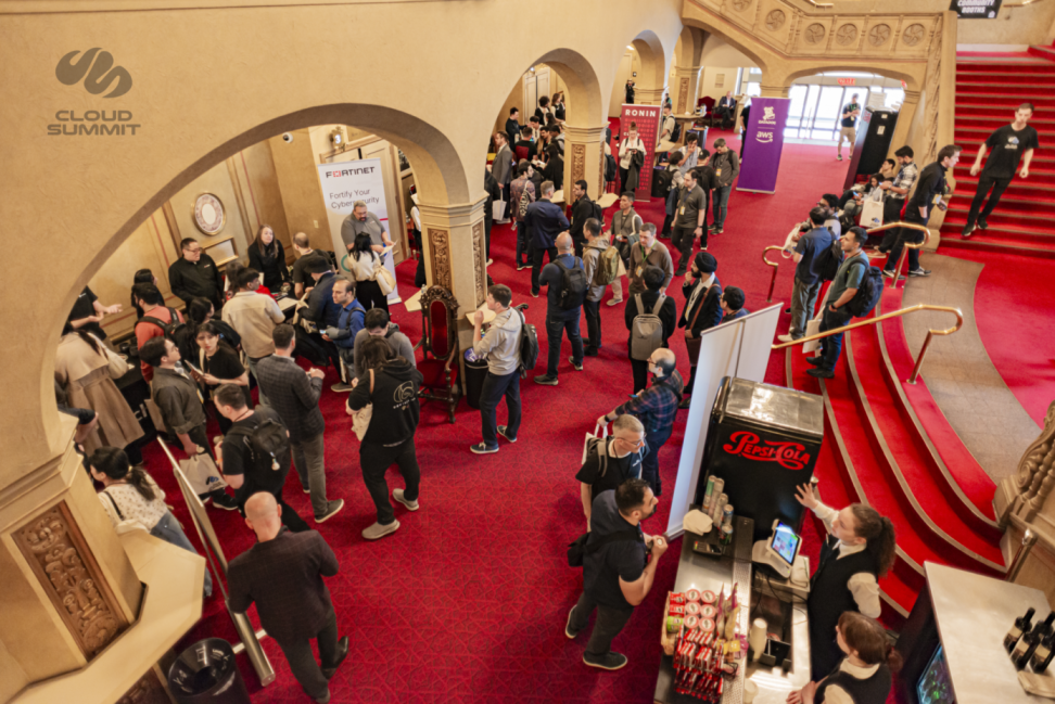 Cloud Summit attendees networking during the event