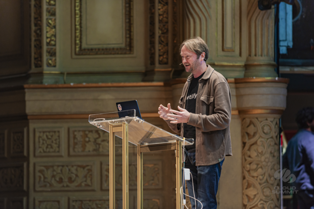 Cloud Summit community members connecting the stage